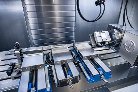 Multi-vise production setup on a 4th-axis machine bed
